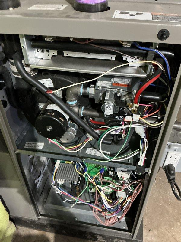 Completed annual heating maintenance on residential gas furnace system. Performed comprehensive tune-up including inspection of heat exchanger, burner assembly, gas valve, and ignition components. Verified proper operation of blower motor, control board, and all safety devices including pressure switches and flame sensor. Checked electrical connections, tested thermostat communication, and confirmed proper airflow throughout system. Cleaned burners and inspected flue piping for proper venting. All components found operating within manufacturer specifications with no deficiencies noted. System tested under full heating cycle and confirmed proper operation. Unit left in excellent working condition.