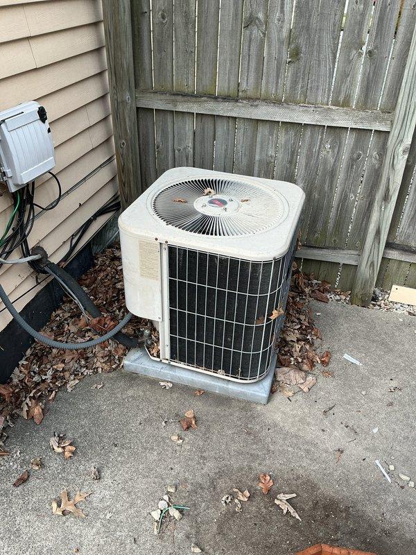 Completed scheduled Air Care Cooling maintenance on residential outdoor condenser unit. Performed comprehensive system inspection, cleared debris and leaves from around unit and concrete pad, verified proper airflow through condenser coils and top discharge grille, and confirmed electrical connections at disconnect box were secure with refrigerant lines properly insulated.