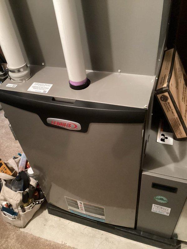 Performed city certification maintenance inspection on Lennox furnace system for real estate transaction purposes. Conducted comprehensive evaluation of unit operation, safety controls, and venting system to meet municipal certification requirements. Documented equipment condition with photographs showing proper installation of intake and exhaust PVC venting, verified manufacturer specifications, and confirmed unit meets standards for city certification approval.