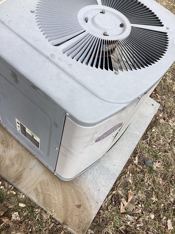 # HVAC Maintenance - AHC Completed

Performed comprehensive air conditioning and heating maintenance service on residential split system. Replaced humidifier pad and furnace filter as scheduled. Inspected outdoor condenser unit, confirming proper fan operation and checking refrigerant levels. Unit exterior in good condition with no visible damage or deterioration. Opened electrical panel and inspected internal components including capacitor, contactors, and wiring connections. Noted significant rust and corrosion present in lower compartment of outdoor unit, indicating previous moisture exposure. All electrical connections secure and functioning properly despite oxidation in bottom section. Documented equipment condition with photographs for service records. System operating within normal parameters at time of service completion.