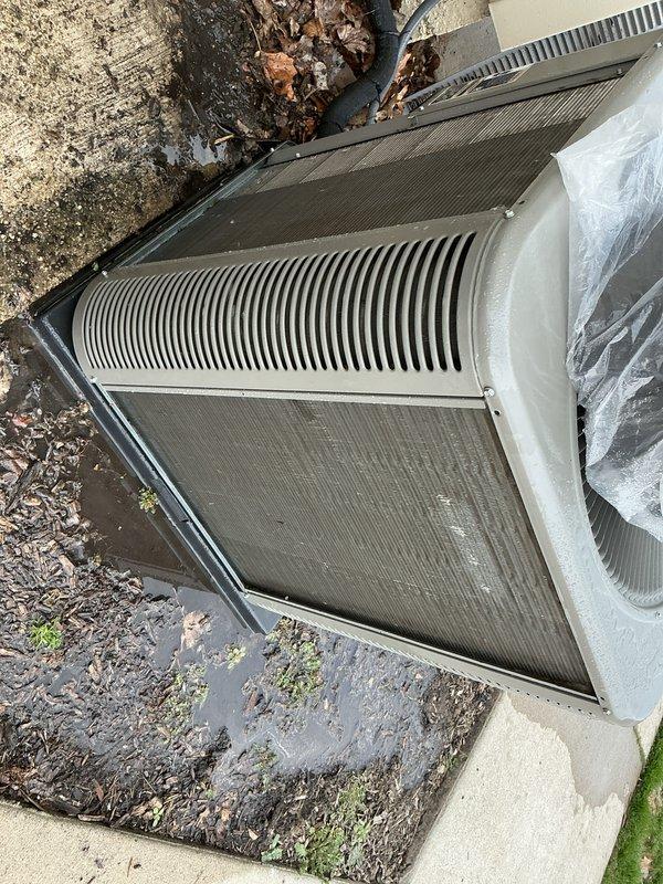 Completed annual cooling maintenance on outdoor HVAC unit. Inspected condenser coils, verified proper operation of all components, and cleared debris from around unit base and surrounding area. System operating within normal parameters with no issues identified during routine maintenance check.