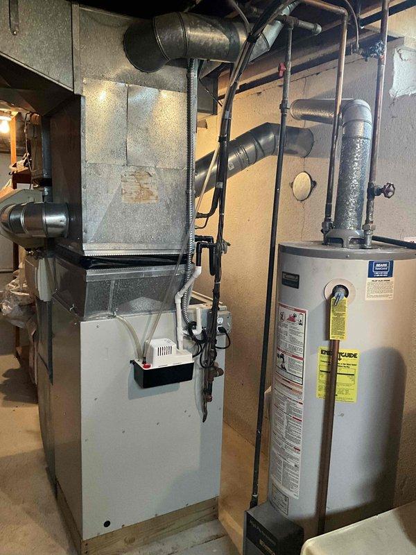 Conducted comprehensive assessment of 27-year-old Tempstar furnace system requiring major repair work. Evaluated existing basement HVAC equipment including furnace unit with connected ductwork, humidifier component, and associated mechanical systems. Provided detailed replacement estimate for new furnace installation, as existing unit had exceeded serviceable lifespan and repair costs were not economically viable given the age and condition of the equipment.