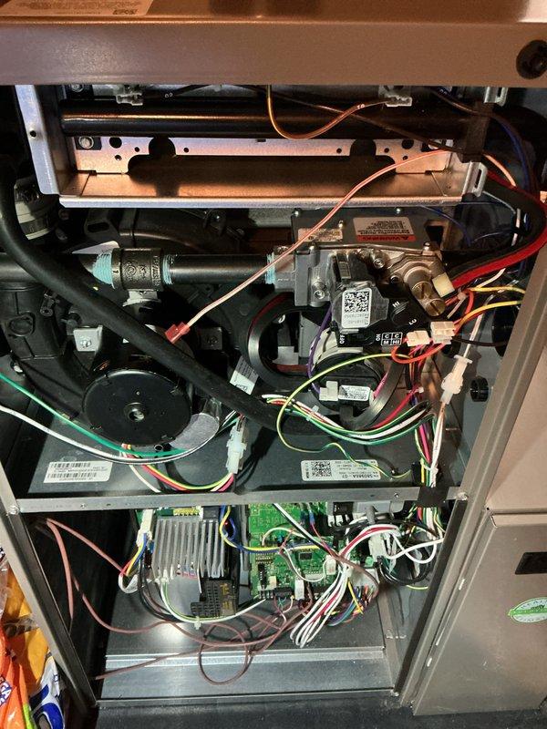 Completed annual HVAC maintenance on residential forced air system. Performed comprehensive inspection of furnace internal components including gas valve assembly, inducer motor, control boards, and electrical connections; verified all components operating within normal parameters with proper wiring configurations. Inspected outdoor condensing unit, confirmed ventilation grille clear of obstructions and equipment in serviceable condition.