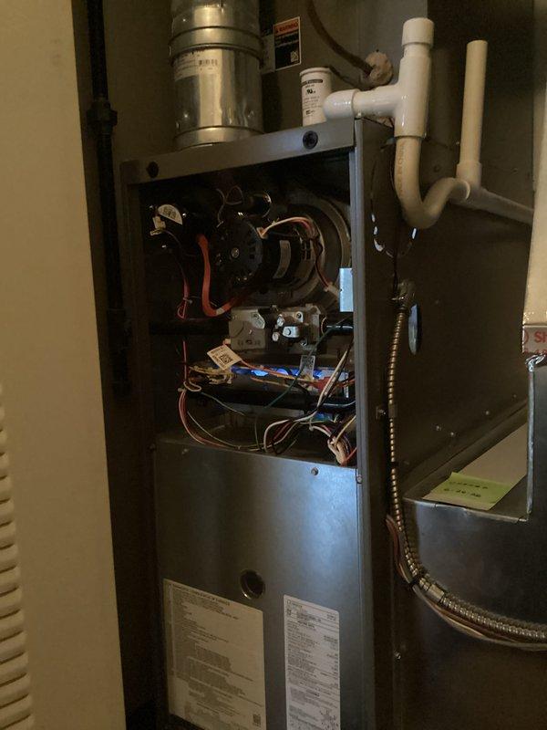 Completed annual heating maintenance on a 10-year-old gas furnace system. Performed comprehensive tune-up including inspection of blower motor assembly, gas valve operation, electrical connections, and control board functionality. Verified all wiring connections were secure, checked burner assembly and heat exchanger, tested safety controls, and confirmed proper system operation. Unit found to be in good working condition with all components functioning as designed.