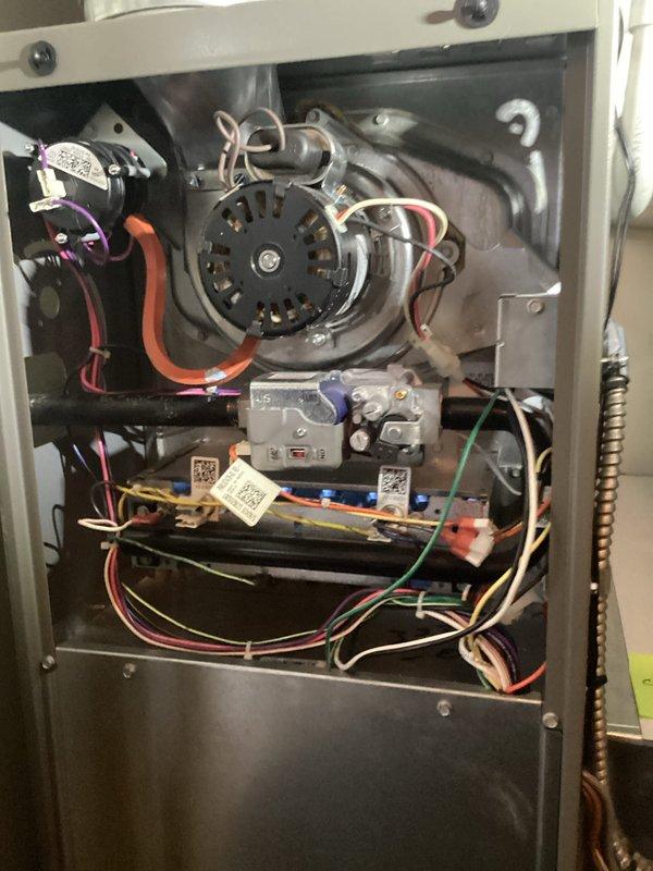 Completed annual heating maintenance on a 10-year-old gas furnace system. Performed comprehensive tune-up including inspection of blower motor assembly, gas valve operation, electrical connections, and control board functionality. Verified all wiring connections were secure, checked burner assembly and heat exchanger, tested safety controls, and confirmed proper system operation. Unit found to be in good working condition with all components functioning as designed.