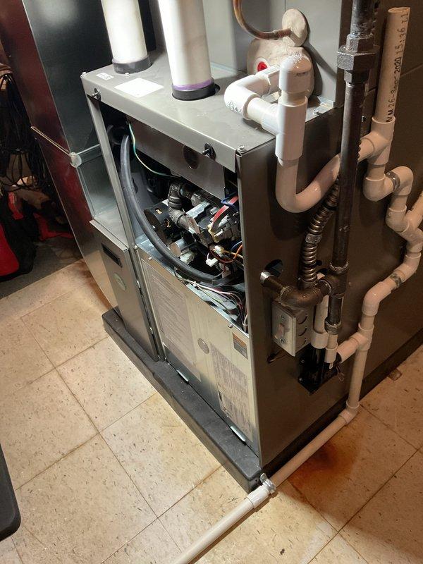 Completed comprehensive ComfortGuard maintenance visit on residential HVAC system, including full inspection and servicing of indoor furnace unit and outdoor condensing unit. Performed standard maintenance protocols on furnace including inspection of blower motor assembly, electrical connections, control panel operations, and PVC venting system integrity. Evaluated outdoor condenser unit condition, cleaned debris from surrounding area, inspected heat exchanger coils and fan assembly operation, and verified proper system performance for continued reliable heating and cooling operation.