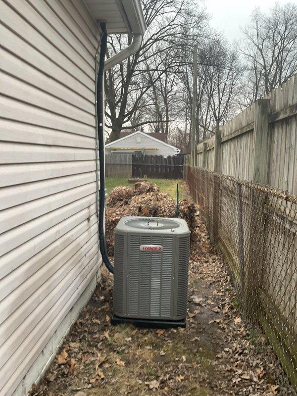 Successfully completed installation of a 2-ton Lennox air conditioning system with matching evaporator coil. The outdoor condensing unit was positioned on a concrete pad in the side yard with proper clearances, while the indoor air handler with coil was installed in the utility room with new refrigerant lines and electrical connections. All mechanical and electrical permits were obtained, system was fully reconnected, tested, and verified operational.