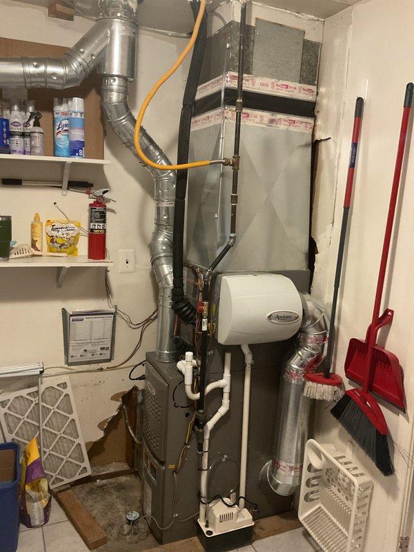 Successfully completed installation of a 2-ton Lennox air conditioning system with matching evaporator coil. The outdoor condensing unit was positioned on a concrete pad in the side yard with proper clearances, while the indoor air handler with coil was installed in the utility room with new refrigerant lines and electrical connections. All mechanical and electrical permits were obtained, system was fully reconnected, tested, and verified operational.