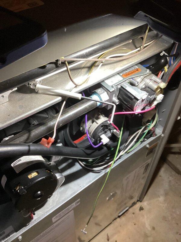 Completed annual furnace maintenance on 10-year-old unit as part of membership tune-up service. Performed comprehensive inspection of internal components including blower motor assembly, electrical connections, and heat exchanger. Verified proper operation of all mechanical systems, checked gas connections, inspected flue piping, and tested safety controls. Also inspected outdoor condensing unit, confirmed adequate clearances, and documented equipment condition with photos. All systems operating within normal parameters with no deficiencies noted at time of service.