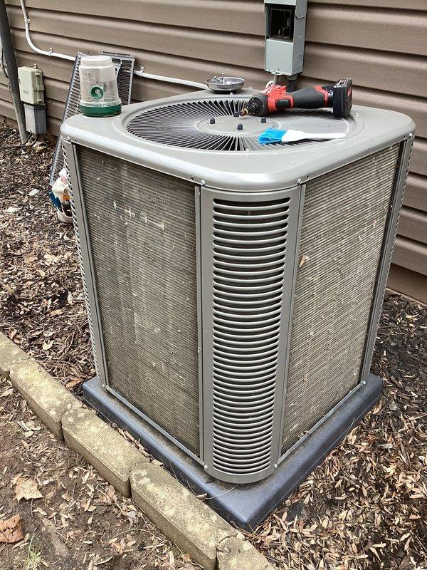 Completed annual furnace maintenance on 10-year-old unit as part of membership tune-up service. Performed comprehensive inspection of internal components including blower motor assembly, electrical connections, and heat exchanger. Verified proper operation of all mechanical systems, checked gas connections, inspected flue piping, and tested safety controls. Also inspected outdoor condensing unit, confirmed adequate clearances, and documented equipment condition with photos. All systems operating within normal parameters with no deficiencies noted at time of service.