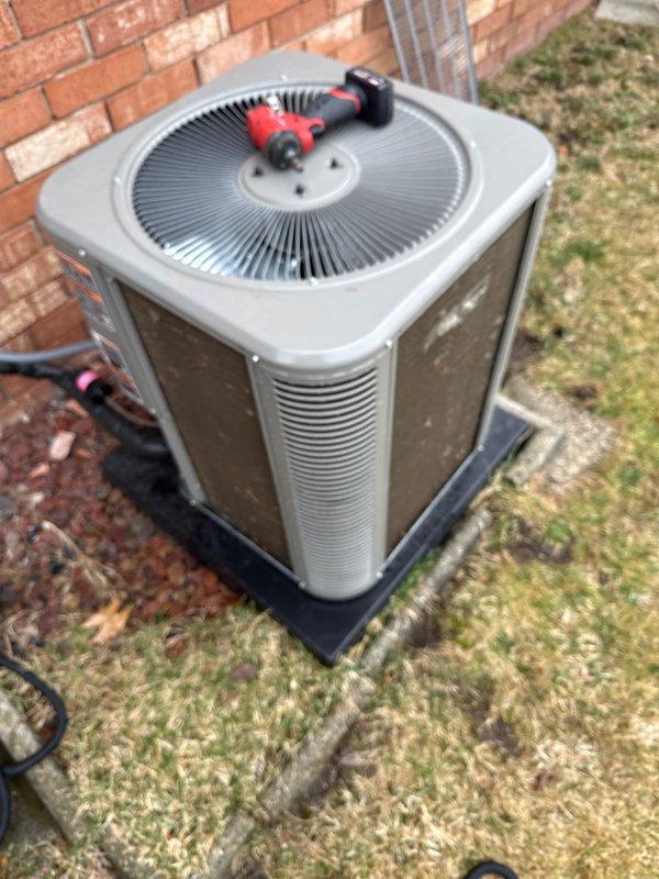 Completed routine Air Care Cooling maintenance on residential outdoor condensing unit. Performed standard ACM inspection protocol including visual assessment of unit condition, refrigerant line inspection, and verification of proper equipment placement on protective pad. Unit found in operational condition with manufacturer labeling intact and all components accessible for service.