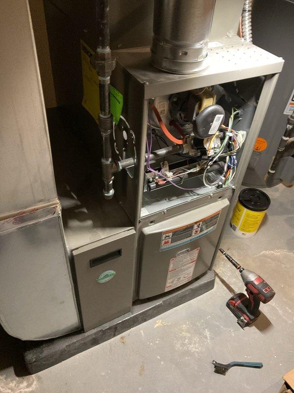 Completed annual preventative maintenance on residential furnace system per membership agreement. Performed comprehensive tune-up including inspection of blower motor assembly, control board, and all electrical connections. Verified proper operation of all internal components, cleaned burner assembly, checked wiring harnesses for secure connections, and tested system controls. Unit operating within normal parameters with no issues identified.