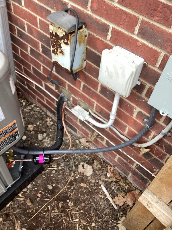 Completed full HVAC system installation including a 90,000 BTU furnace and 2.5 ton air conditioning unit with rear discharge configuration. Obtained mechanical and electrical permits prior to installation, then performed complete system setup and reconnection of all necessary components. Documented installed equipment with identification labels and verified proper placement of outdoor condenser unit and associated electrical connections.