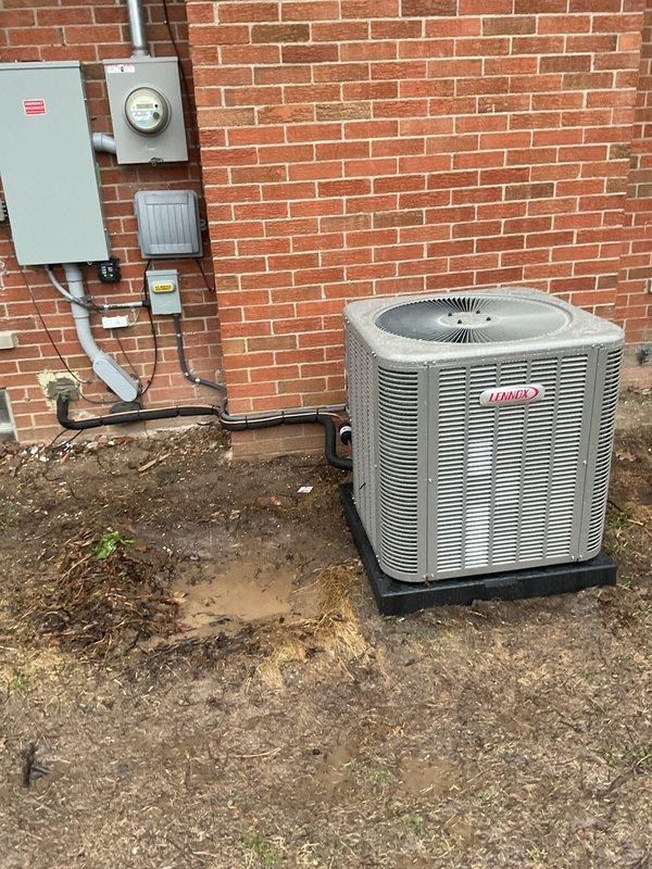 Completed installation of 2.5-ton Lennox air conditioning system with matching evaporator coil at rear location of residence. Installed outdoor condenser unit on protective base pad with proper electrical disconnect and reconnection of existing power supply, mounted indoor evaporator coil in utility closet with condensate drain lines and flexible ductwork connections. Mechanical permit obtained prior to installation, all components tested and operational upon completion.