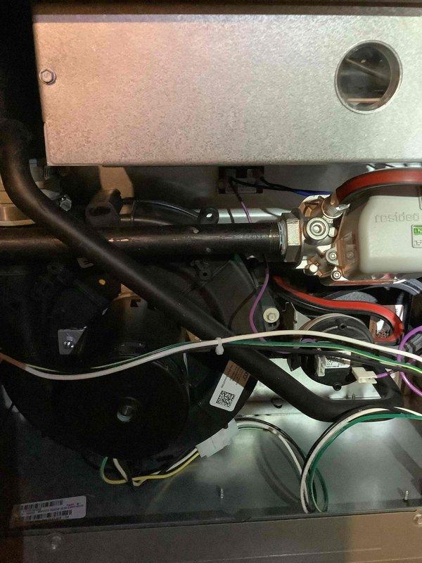 Completed scheduled air handler maintenance on recurring service call. Replaced humidifier pad and furnace filter as requested. Inspected internal components including gas valve assembly, blower motor, control board, and electrical connections. All wiring harnesses, including power and control wiring to Resideo gas valve, showed proper connections with no signs of overheating or damage. Verified proper operation of all mechanical components and control systems. Unit operating within normal parameters upon completion of maintenance.