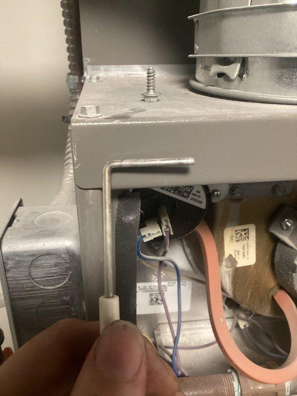 Responded to no heat call on 6-year-old natural gas furnace experiencing intermittent operation. Upon arrival, conducted full system diagnostic including visual inspection of internal components and electrical connections. Accessed furnace cabinet and inspected pressure switch assembly, flame sensor, ignition system, and wiring harness. Identified loose wire connection at pressure switch terminal causing intermittent circuit interruption. Secured connection and verified proper seating of all electrical connectors. Performed amp draw testing on blower motor using digital clamp meter, confirming normal operating current within manufacturer specifications. Cycled system multiple times to verify consistent ignition sequence and proper heating operation. System now functioning normally with no further intermittent issues observed.