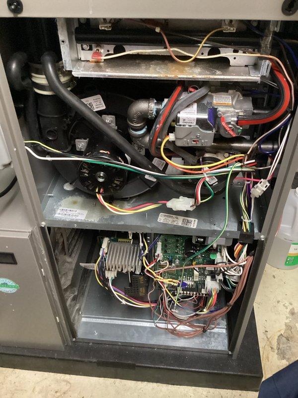 Completed annual furnace heating maintenance and tune-up on gas-fired forced air heating system. Performed comprehensive inspection of all internal components including gas valve assembly, ignition system, blower motor, heat exchanger, control boards, and electrical connections. Verified proper operation of all safety controls, tested gas pressure, inspected burner assembly and flame sensor, checked air filter condition, and confirmed adequate combustion air supply. All wiring connections secured and verified for proper voltage. Unit operating within manufacturer specifications with no deficiencies noted. System tested through complete heating cycle and confirmed satisfactory operation.