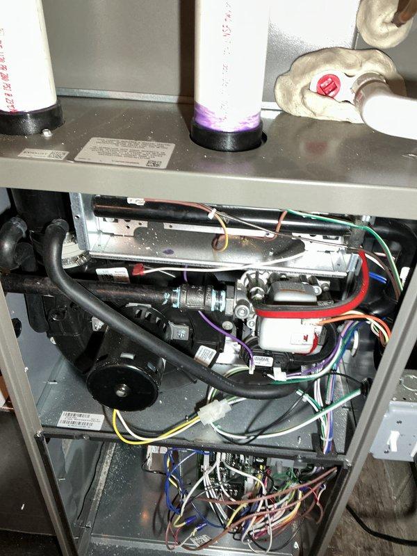 Completed annual heating maintenance on residential furnace system. Performed comprehensive tune-up inspection of all internal components including heat exchangers, blower motor assembly, electrical connections, and condensate drainage system. Verified proper operation of all mechanical and electrical systems, inspected wiring harnesses and connections throughout unit, and confirmed heating system is functioning within normal parameters. Addressed customer request regarding air filter replacement by inspecting filter compartment and reviewing available filter options and sizing requirements on-site.