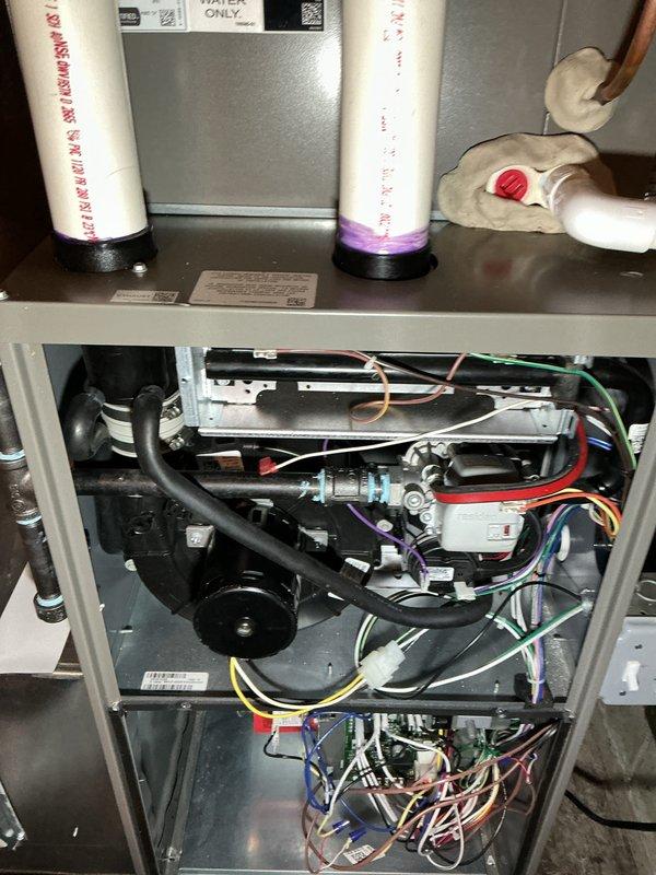 Completed annual heating maintenance on residential furnace system. Performed comprehensive tune-up inspection of all internal components including heat exchangers, blower motor assembly, electrical connections, and condensate drainage system. Verified proper operation of all mechanical and electrical systems, inspected wiring harnesses and connections throughout unit, and confirmed heating system is functioning within normal parameters. Addressed customer request regarding air filter replacement by inspecting filter compartment and reviewing available filter options and sizing requirements on-site.