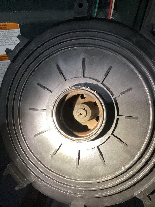 Completed annual HVAC maintenance on air handling unit, including system inspection, filter replacement, and verification of blower assembly operation. Accessed furnace cabinet to inspect electrical connections, gas valve assembly, flame sensors, and blower motor components, confirming all systems functioning properly. All four flame sensors displayed proper blue indicator lights, wiring connections were secure, and blower wheel showed normal wear patterns with adequate airflow performance.