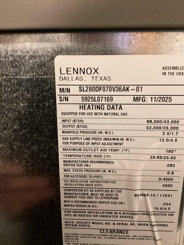 Completed full HVAC system installation including Lennox SL280DF070V36AK-01 furnace with 70,000 BTU input capacity and 2-ton air conditioning unit with rear discharge configuration. Installed new flue liner, set manifold pressure for natural gas operation, verified proper temperature rise parameters, and reconnected all existing ductwork and electrical connections. System tested and operational within manufacturer specifications.