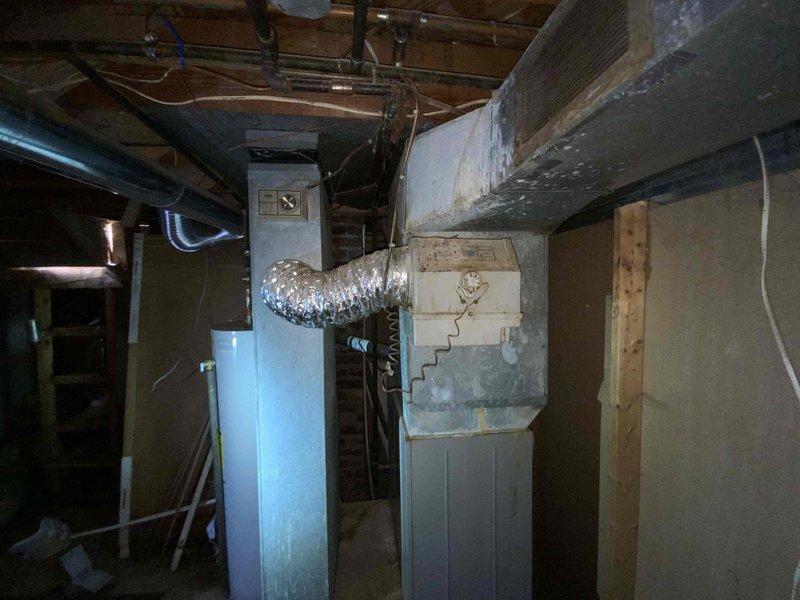Provided estimate for complete furnace replacement of thirty-year-old existing unit in residential basement mechanical room. Assessed existing HVAC equipment, ductwork connections, electrical panel configuration, and structural clearances to determine replacement specifications and installation requirements.