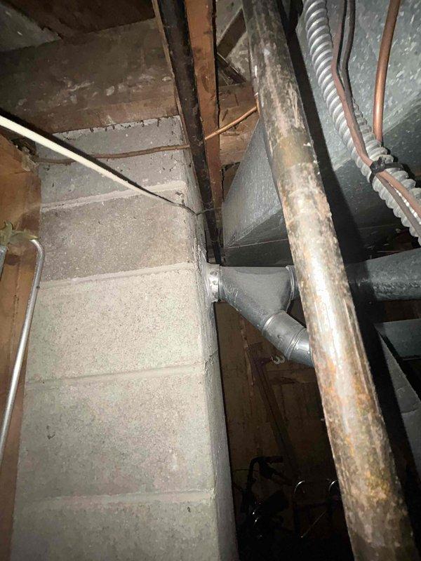 Provided estimate for replacement of non-operational 1998 natural gas furnace located in basement. Unit had been shut off due to failure and required full system replacement. Assessed existing ductwork configuration, water heater proximity, and mechanical room layout to determine proper equipment sizing and installation requirements for new furnace system.