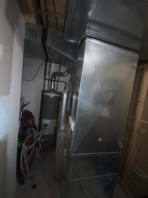 Completed comprehensive estimate for full HVAC system replacement in medium-sized residential property covering 1200-2000 square feet. Assessed existing basement-installed heating and cooling equipment, including furnace, ductwork configuration, and associated components for natural gas or propane-fueled system. Evaluated current sheet metal plenum assembly, rectangular ductwork distribution throughout structure, electrical connections, and gas line routing to provide detailed replacement specifications and equipment recommendations for complete system upgrade.