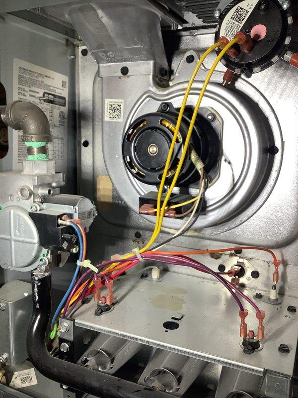 Completed annual heating maintenance on residential HVAC system. Performed comprehensive inspection of blower motor assembly, gas valve controls, electrical connections, and safety switches. Verified proper operation of all system components, checked wiring integrity throughout control board and junction box, and confirmed burner assembly functionality with no issues identified.