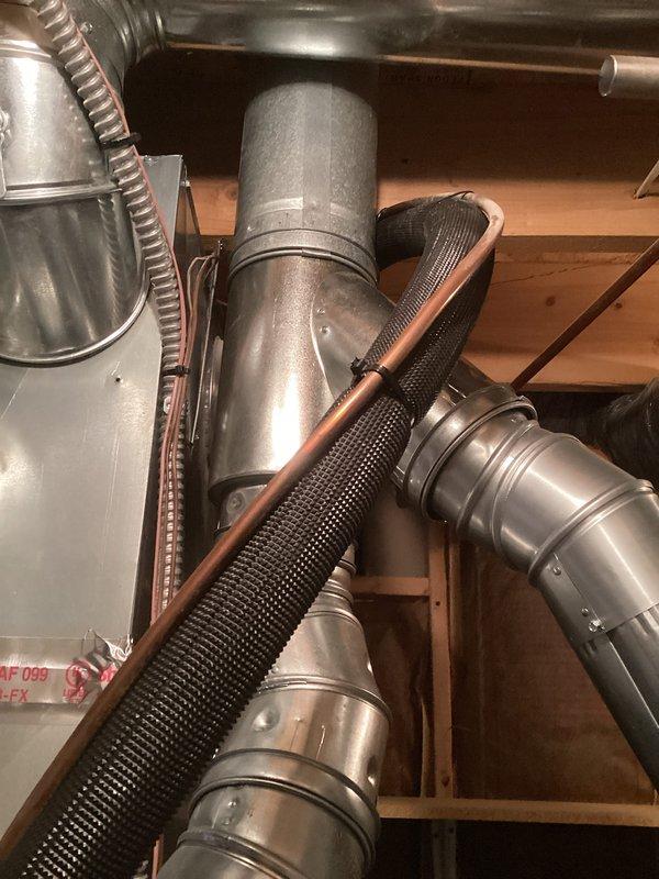 Completed full HVAC system installation including a 90,000 BTU furnace with humidifier and 2.5-ton air conditioning unit with rear discharge configuration. Installed all necessary ductwork in attic space with proper support and connections, placed outdoor condenser unit on concrete pad against building exterior, and reconnected all electrical and mechanical components. Mechanical and electrical permits were obtained prior to installation, and all utility rebate documentation was processed for applicable energy efficiency programs.