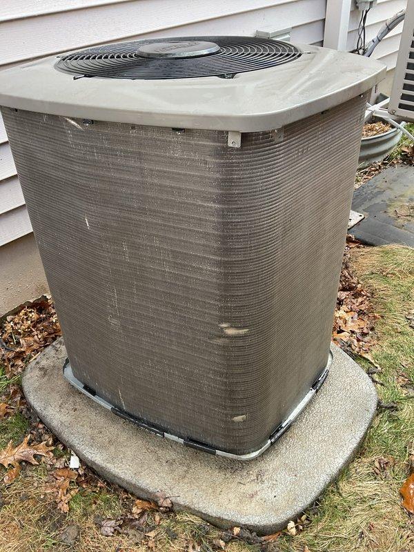 Completed routine preventative maintenance on residential air conditioning system. Performed thorough inspection of outdoor condenser unit, cleaned heavily soiled exterior coil surfaces to restore proper airflow and heat transfer efficiency, and verified operational status of all components. Unit returned to normal operating condition with improved performance capability.