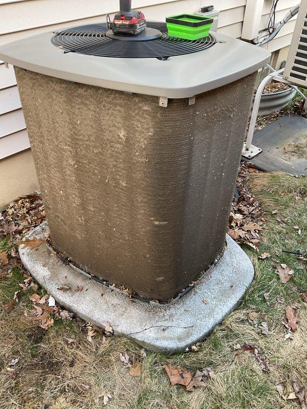 Completed routine preventative maintenance on residential air conditioning system. Performed thorough inspection of outdoor condenser unit, cleaned heavily soiled exterior coil surfaces to restore proper airflow and heat transfer efficiency, and verified operational status of all components. Unit returned to normal operating condition with improved performance capability.