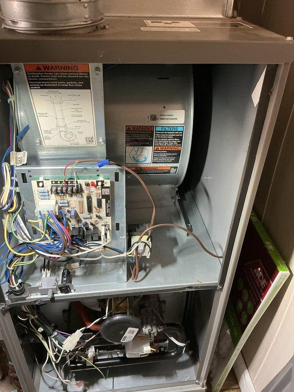 Performed city certification inspection and complete furnace cleaning and check on residential HVAC system. Accessed unit cabinet, inspected all internal components including blower motor assembly, control board, electrical connections, and refrigerant lines. Verified proper operation of all safety controls, circuit breakers, and wiring harnesses. Cleaned blower assembly and internal surfaces, checked copper refrigerant line connections, and ensured all warning labels were legible and properly affixed. System tested and confirmed operational within manufacturer specifications. Advised occupant that any required certification paperwork must be present at the property for completion.