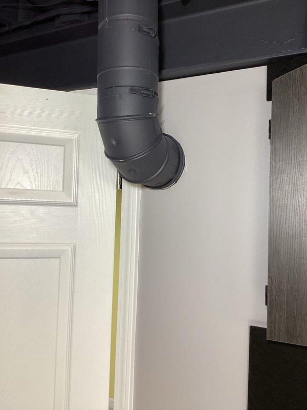 Responded to service call for leaking tanked water heater discovered during home inspection by new homeowners. Inspected water heater and confirmed minor leak with containment in place. Additionally evaluated furnace flue pipe as requested, identifying improper pitch with visible dip in horizontal run that requires correction to ensure proper draft and code compliance. Documented existing conditions of both water heater leak and furnace flue configuration with photographs. Provided recommendations for water heater repair or replacement based on unit age and extent of leak, and advised on furnace flue pipe resloping or replacement to achieve proper upward angle for safe exhaust ventilation.