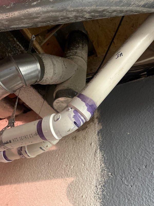 Responded to service call for water leaking around furnace with blinking red indicator light. Upon inspection, identified condensate drain issue affecting furnace operation. Performed complete tune-up maintenance on new furnace system, including inspection of heat exchanger, burner assembly, and ignition components. Cleared condensate line blockage, verified proper drainage, and tested all safety controls. Reset fault code, confirmed normal furnace operation with no error lights, and documented installation with photos of HVAC ductwork and water heater connections in attic space for service records.