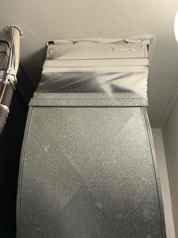 Conducted comprehensive assessment of 30-year-old natural gas furnace and air conditioning system located in main floor closet for replacement estimate. Evaluated existing equipment configuration, including furnace unit with associated ductwork, PVC condensate drainage, copper refrigerant lines, and blower assembly showing age-related wear and dust accumulation. Documented current installation layout and identified necessary considerations for replacement system installation, including existing utility connections, ventilation requirements, and structural conditions in mechanical space.
