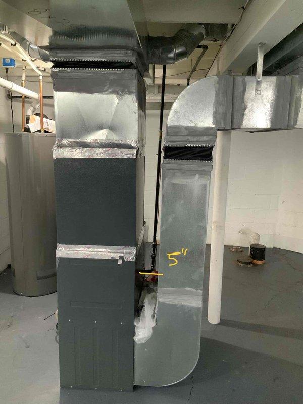 Completed comprehensive site evaluation for full HVAC system installation at residential property with no existing air conditioning infrastructure. Assessed basement mechanical room layout and existing furnace configuration to determine optimal placement for new condensing unit, air handler integration, and ductwork modifications. Documented current Goodman furnace installation, measured clearances for equipment placement including 5-inch spacing requirements for refrigerant line routing, evaluated electrical service capacity, and identified condensate pump location for proper drainage planning. Provided detailed estimate for complete air conditioning system installation with recommendations for equipment sizing and installation timeline within customer's requested two to three week timeframe.