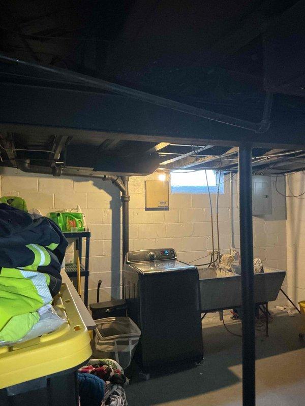 Provided comprehensive estimate for replacement of aging Evcon furnace and air conditioning system located in basement mechanical room. Current equipment is operational but has reached end of useful service life. Evaluated existing ductwork configuration, electrical connections, and installation space requirements for new HVAC system replacement.