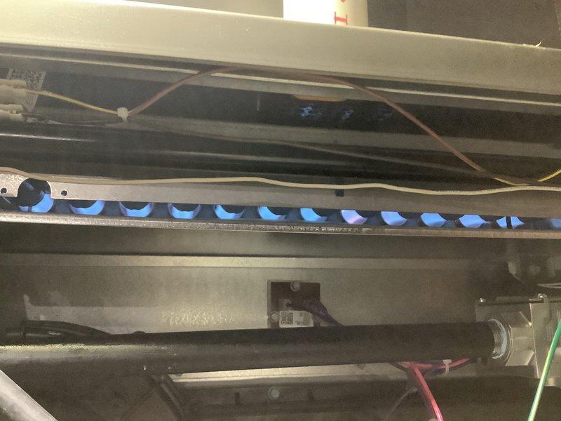 Completed annual heating maintenance on residential forced air gas furnace. Performed comprehensive system inspection including blower motor assembly, electrical components, gas burner operation, and heat exchanger. Verified proper ignition sequence and observed clean blue flame pattern across all burner ports, indicating efficient combustion. Inspected all electrical connections, control board, and wiring harnesses for proper operation. System operating within normal parameters with no deficiencies noted.