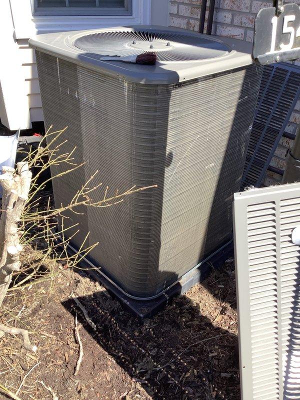 Completed scheduled Air Care Heating and Cooling maintenance on residential HVAC system. Inspected outdoor condenser unit, confirmed proper operation of fan motor and compressor, checked refrigerant levels, and cleaned condenser coils. Verified electrical connections at disconnect box, tested capacitor readings, and ensured adequate airflow through louvered panels. Unit operating within normal parameters with no deficiencies noted at time of service.