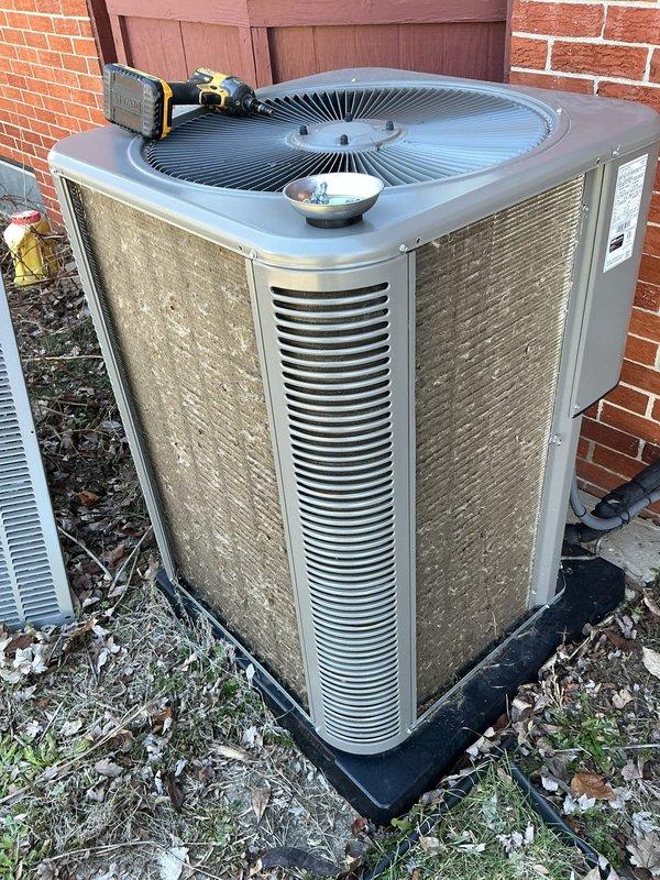 Completed scheduled Air Care Maintenance on residential air conditioning system. Performed thorough inspection of outdoor condenser unit, which showed significant accumulation of dirt, grime, and environmental debris on exterior panels and condenser coils. Cleaned condenser coil fins to remove dust and organic buildup, restoring proper airflow through the unit. Verified fan operation and checked unit for proper mechanical function. System operating within normal parameters upon completion of maintenance service.