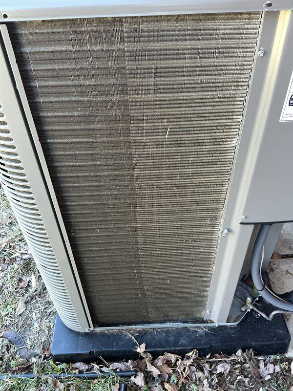 Completed scheduled Air Care Maintenance on residential air conditioning system. Performed thorough inspection of outdoor condenser unit, which showed significant accumulation of dirt, grime, and environmental debris on exterior panels and condenser coils. Cleaned condenser coil fins to remove dust and organic buildup, restoring proper airflow through the unit. Verified fan operation and checked unit for proper mechanical function. System operating within normal parameters upon completion of maintenance service.