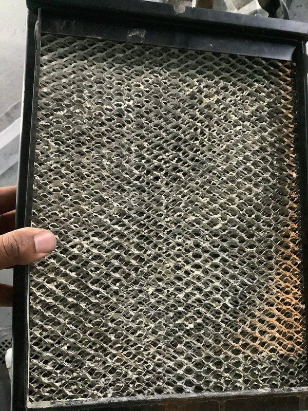 Completed scheduled preventive maintenance on air conditioning system. Inspected and measured system temperatures, recording evaporator coil temperature at 23.1°F. Removed and assessed air filter, which showed significant accumulation of dust and debris requiring replacement to maintain proper airflow and system efficiency.