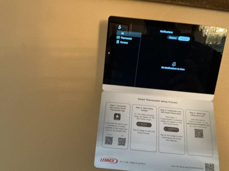 Completed routine Air Care Maintenance on residential HVAC system. Inspected Lennox smart thermostat operation and verified proper functionality, checked evaporator coil assembly and filter condition, and confirmed condensate drain lines were clear and draining properly. All system components operating within normal parameters.