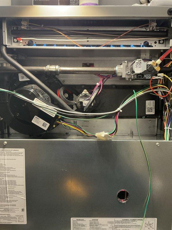 Completed annual furnace maintenance and tune-up on residential heating unit per membership agreement. Performed comprehensive inspection of all internal components including blower motor, gas valve assemblies, heat exchanger, burner assembly, electrical connections, and control modules. Verified proper operation of all safety controls, checked wire harness connections, inspected PVC venting system, and confirmed unit functionality. All components found in good working condition with no issues identified.