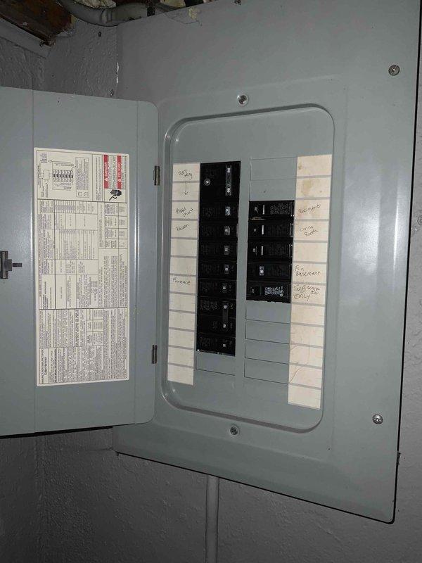 Completed full system estimate for forced air natural gas furnace and air conditioning replacement in basement of single-story bungalow residence. Assessed existing HVAC equipment configuration, including current furnace unit with dual PVC vent piping system and adjacent water heater placement. Evaluated electrical panel capacity and circuit availability for new equipment installation requirements. Documented existing ductwork layout with metallic foil insulation and flexible conduit routing. Photographed mechanical room conditions, equipment clearances, and utility connections to provide comprehensive proposal for complete HVAC system replacement under promotional equipment offer.