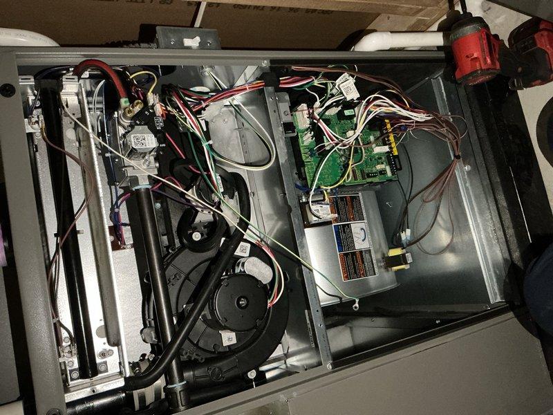 Completed scheduled Air Handler Maintenance on residential HVAC system. Performed comprehensive inspection of air handler unit including blower motor, control boards, electrical connections, and integrated whole-home humidifier system. Verified all components operating within normal parameters, wiring secure, and humidifier properly mounted to supply ductwork with functional electrical connections.