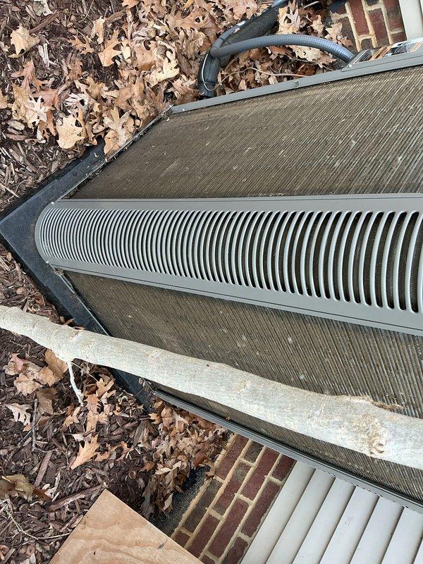 Completed routine Air Care Maintenance on outdoor condensing unit. Inspected condenser coil and noted significant accumulation of dust, debris, and leaf matter on fins and surrounding area. Identified filter requirement HCF20-11 (MERV 11) and documented equipment condition with photos showing dirt buildup on heat exchanger surfaces and seasonal debris around unit perimeter.