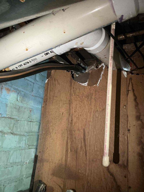 Conducted estimate for complete HVAC system replacement in basement location. Existing furnace and air conditioning unit are non-operational and have reached end of service life at 25-30 years old. Evaluated current installation including utility area with existing ductwork, plumbing infrastructure, and electrical connections. Assessed basement mechanical room conditions including painted cinder block walls showing moisture deterioration, existing PVC drain and vent lines, copper refrigerant piping, and metal supply ductwork. Documented installation space constraints and utility routing for proper equipment sizing and placement recommendations. Provided comprehensive replacement options for new high-efficiency heating and cooling system appropriate for residential application.