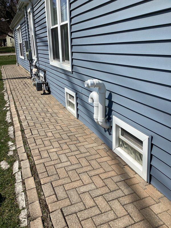 Completed full HVAC system installation including a 90,000 BTU gas furnace and 3-ton air conditioning unit with rear discharge configuration. Obtained mechanical and electrical permits prior to installation, ran refrigerant lines with proper insulation through exterior wall, installed exterior condensing unit on existing paver pad, and mounted electrical disconnect box on exterior siding. Reconnected all necessary utilities, verified proper system operation, and completed all required paperwork including financing documentation with signed agreements and identification verification on file.